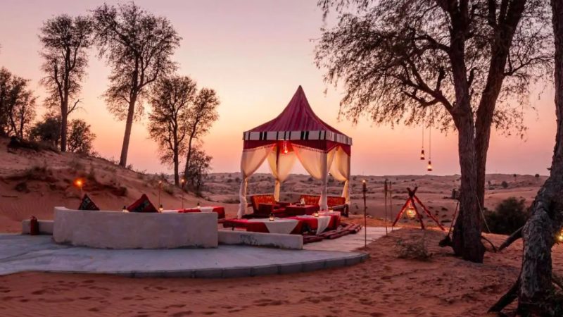 Desert camp with a traditional tent at sunset in Ras Al Khaimah