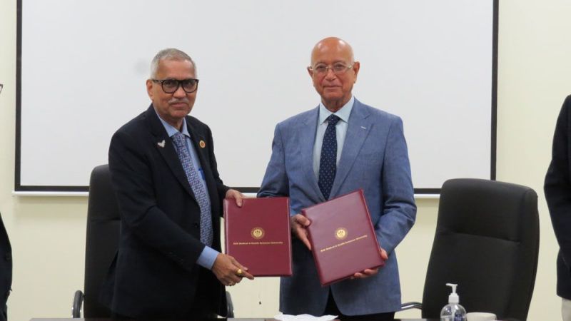 MOU Signing Ceremony between Gulf Medical University (GMU) & RAKMHSU — photograph 2 of 3